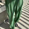 model wearing moss green pointelle balloon pants