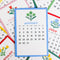 scattered months of 2027 colorful desk calendar with scandinavian folk floral print