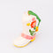 side view of pink ceramic cowboy boot ornament with pink floral detail