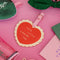 red heart 'cute little luggage tag' with cream scalloped edge and pink strap