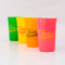set of 4 colorful plastic stadium cups with 'greetings from camp friendship!' across the front