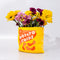 sideview of yellow potato chips shaped vase with flowers inside