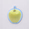 green apple shaped sticky notepad