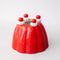 side view of red jello mold vase/planter