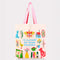 cream tote bag with two-tone pink and red handles and 'I'd rather be reading' typography with colorful folk inspired graphics