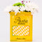 yellow pasta box ceramic vase with flowers inside