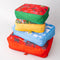 Staggered set of 4 packing cubes with various sayings and realistic prints