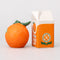 sideview of orange shaped and orange juice carton salt and pepper shakers