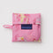 packaged bright pink baby baggu with melting gold star print