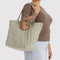 model carrying sage (celadon) cloud bag