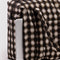 brown blurred gingham cloud carry-on with laptop sticking in the back