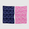 flattened set of two smiley hand towels: light pink/fuchsia, and dark blue/cobalt blue