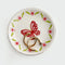 cream dish with pink and red butterfly and floral print