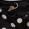 interior key leash of black medium crescent with white polka dots