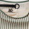 interior key leash of pale sage and white vertical stripe medium crescent bag