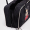 interior of black bowler bag with white piping and embroidered mickey head and red 'MICKEY' font