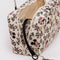interior of cream bowler bag with mickey and minnie head print surrounded by dainty floral