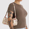 model carrying nylon loaf bag with cream ground and abstract floral print