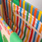Colorful stripe interior of rattan market tote with colorful fruit tile accents