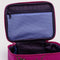 up close of deep fuchsia small cosmetic bag with cherry print