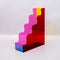 left view of red, pink, yellow and blue acrylic wavy file folder holder