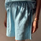 model wearing sky blue cotton flared shorts and matching top