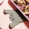 flattened grey silicone cat pot holder with a pan on it