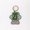 enamel keychain with green book man with arms, face and legs