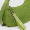 lime green keychain with grey 'baggu' logo and carabiner clip on a bag