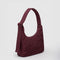 side view of mahogany mini nylon shoulder bag with matching strap and trim