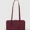 mahogany rectangular nylon bowler bag with matching zipper and charm clasp