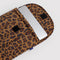leopard 16 in. puffy laptop sleeve with laptop sticking out.