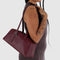 model carrying medium mahogany recycled dome bowler bag with silver charm clasp