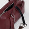 black key leash of mahogany small dome recycled leather bowler bag with silver charm clasp