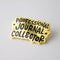 gold pin that says professional journal collector