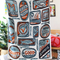 white tea towel with orange and blue sardine can print