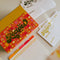 retro 70's print recipe box with gold foil 'RECIPES' across the front and included recipe cards and dividers