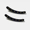 set of two large black curved hair clips with yellow rhinestones