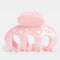 front view of light pink small octopus hair claw