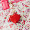 red heart keychain charm on a bag