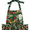 up close of green ladybug and floral cotton apron with large front patch pockets