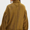 back view of model wearing slouchy olive green textured open front cardigan