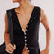 model wearing black ribbed button front tank
