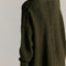 back view of model wearing oversized green textured cardigan