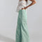 side view of model wearing mint wide leg jeans