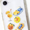 holographic orange stickers on a phone