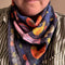model wearing navy bandana with colorful chicken print