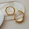 gold pebble hoop earrings