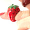 up close of red strawberry enamel dome ring