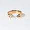 gold touching hands ring